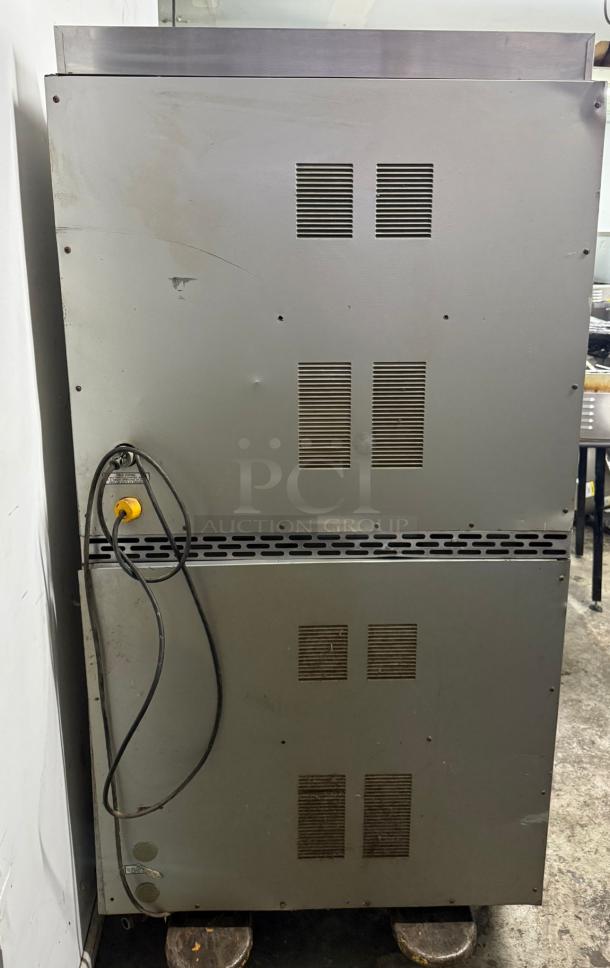 Market Forge M2700HEC double stacked convection oven with vented exterior and power cord. Moderate wear visible.