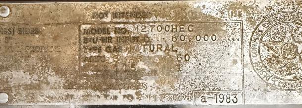 Market Forge M2700HEC model plate, indicating natural gas input of 60,000 BTU/hr. Worn but legible.