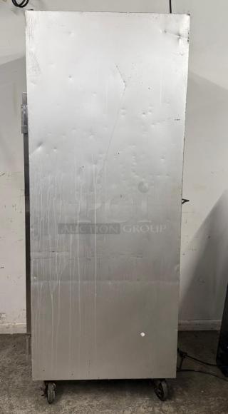 TRAULSEN G10010 30" reach-in refrigerator with right hinged door, signs of wear, dents, ideal for commercial use.