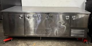 Stainless steel Universal Coolers worktop refrigerator with one side freezer, four doors, and ventilation grille.