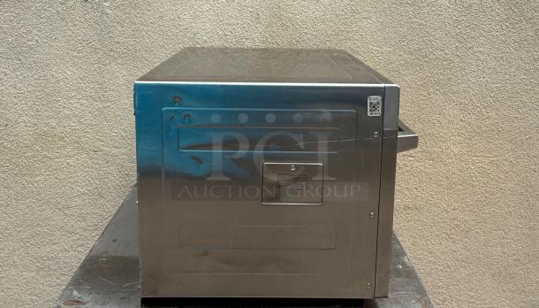 Panasonic NE-2180 Sonic Steamer Commercial Microwave Oven, stainless steel, side view, visible QR and label markings.