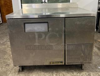 TRUE TWT-44-HC worktop refrigerator with backsplash, stainless steel, used condition, 44 1/2" deep, visible model tag.
