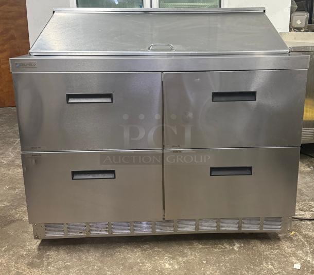 DELFIELD D4448NP-18M 48" refrigerated sandwich prep table with 4 drawers and 5" casters, stainless steel, excellent condition.