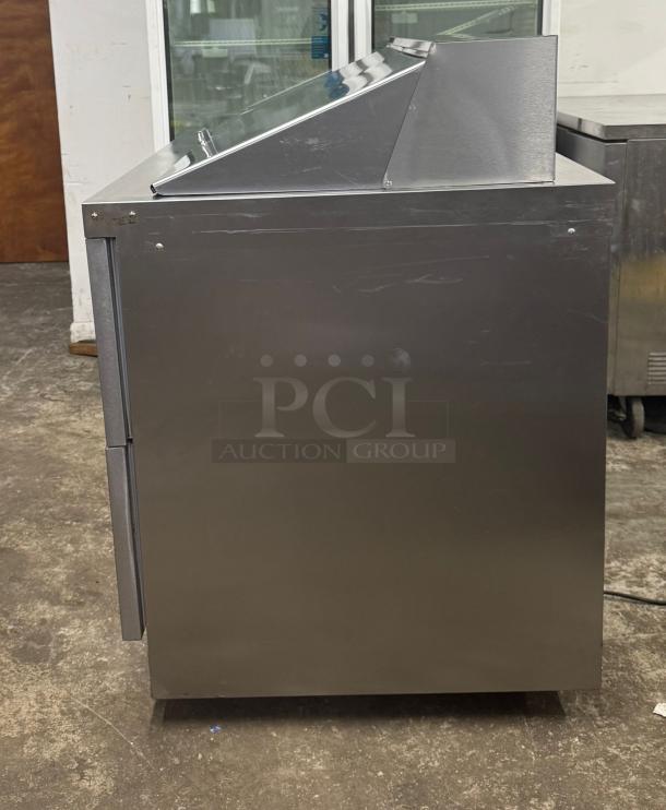 Delfield D4448NP-18M refrigerated sandwich prep table, 48" width, 4 drawers, stainless steel, 5" casters, front breathing.
