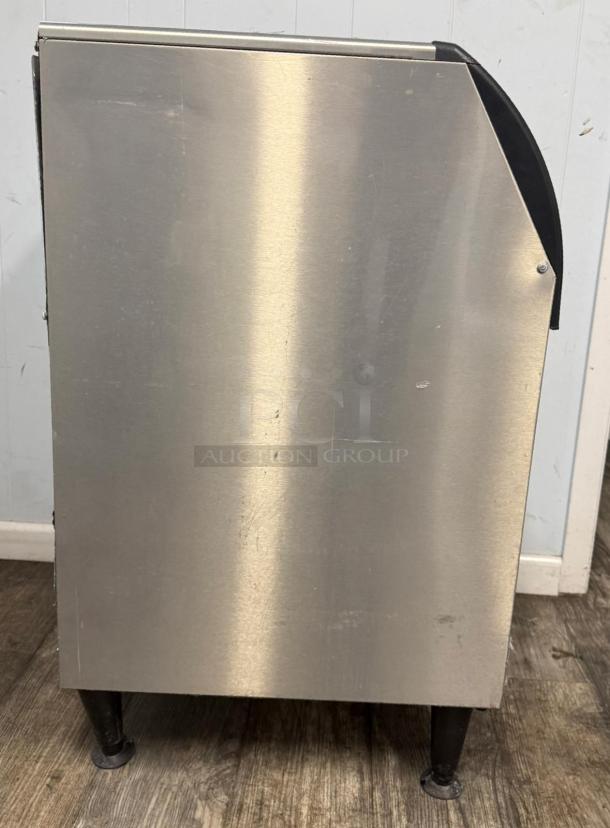 Scotsman CU0920MA-1A undercounter ice machine, stainless steel, visible side, scratches, four legs, used condition.