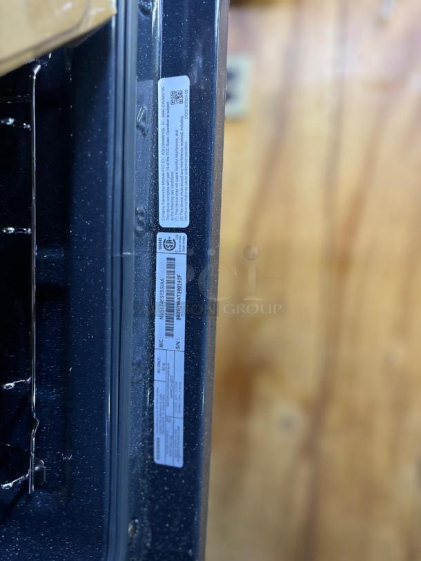 Samsung NV31T4551SS 24" single built-in wall oven. True Convection feature. Serial number visible. Like-new condition.