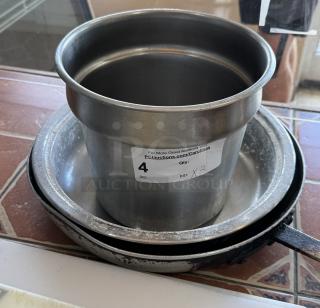 Metal pans, assorted types, visible wear, auction label indicates "qty 3," suitable for kitchen or industrial use.