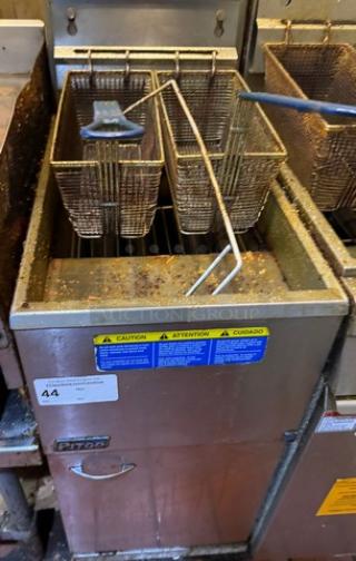 Pitco Fryer with baskets, stainless steel, tested and working, visible caution labels, some wear marks.