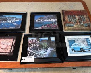 Set of six Italian-themed artworks with black frames. Includes coastal and street scenes. Good condition. Item tag: 50.