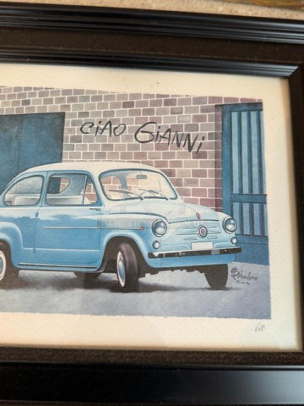 Framed Italian artwork featuring a light blue vintage car, signed by artist. "Ciao Gianni" text visible.