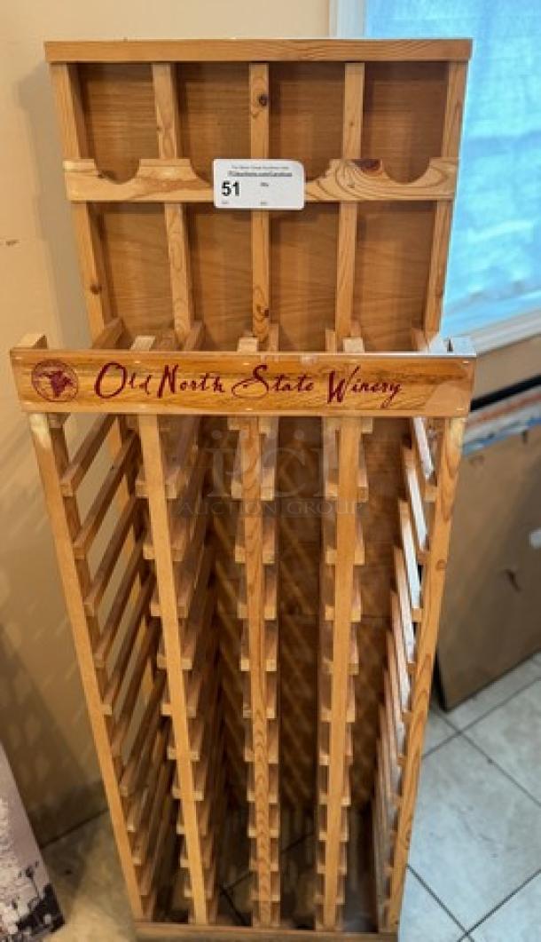 Wooden wine bottle holder, Old North State Winery branding, vertical slats, holds multiple bottles, natural finish, good condition.