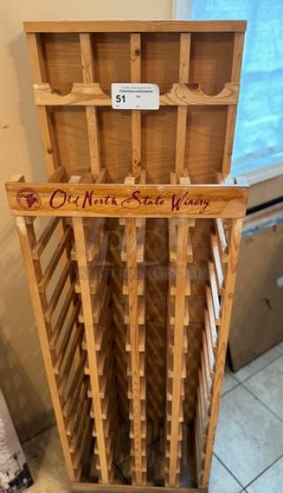 Wooden wine bottle holder, Old North State Winery branding, vertical slats, holds multiple bottles, natural finish, good condition.