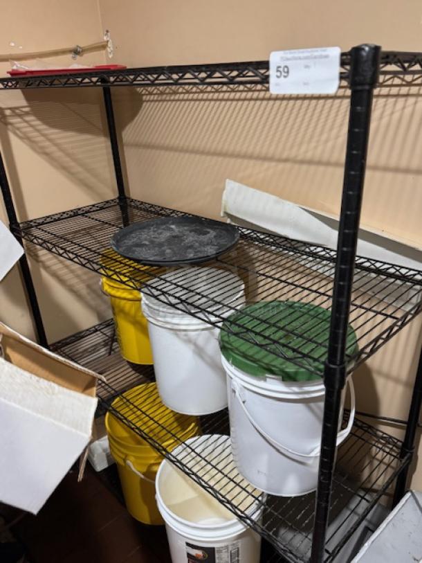 Wire shelving rack with multiple buckets; features adjustable shelves and sturdy metal construction; item tag "59" visible.