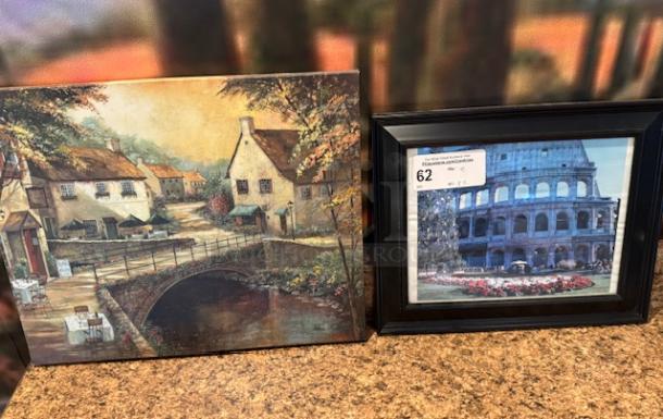 Italian artwork set, including a village painting and a framed photo of the Colosseum. Auction tag 62 visible on the frame.