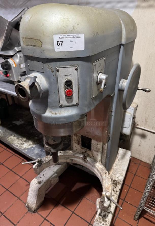 Hobart 60 Qt. Mixer, model H600, 3 phase, industrial use, metallic finish, visible wear, auction label number 67.