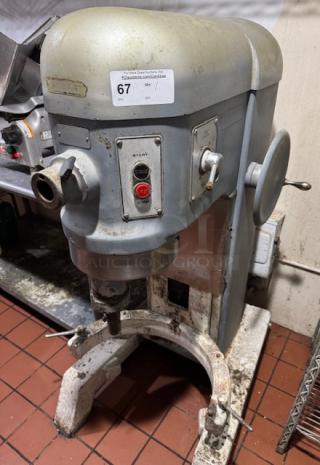 Hobart 60 Qt. Mixer, model H600, 3 phase, industrial use, metallic finish, visible wear, auction label number 67.