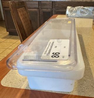 4-well condiment holder with lid, in good condition, includes label with item number 86. Suitable for organizing condiments.