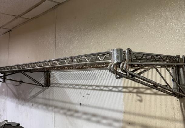 Wire wall shelving, metal construction, good condition, sturdy design, ideal for storage, four available for auction.