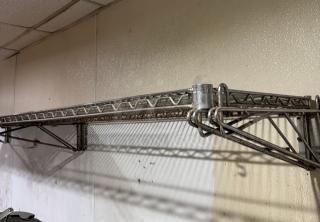Wire wall shelving, metal construction, good condition, sturdy design, ideal for storage, four available for auction.