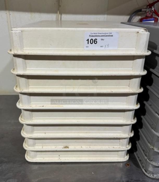Stack of 8 white dough pans, used condition, with auction label "106". Sturdy design for bakery or pizzeria use.