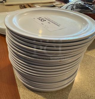 Stack of 22 G.E.T DP509 9" white ceramic dinner plates, marked with lot number 133, in good condition.