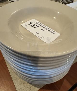 White ceramic pasta bowls, 14 pieces, stacked, with auction label indicating lot 137. Minimal signs of wear.