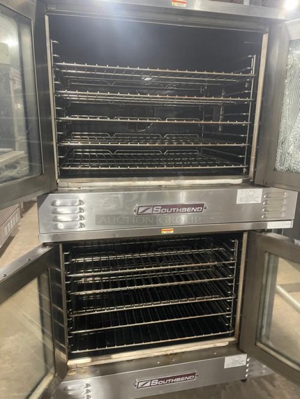 Southbend SLGS/22SC double-stacked convection oven, stainless steel, thermostatic control, natural gas, wired rack, on casters.