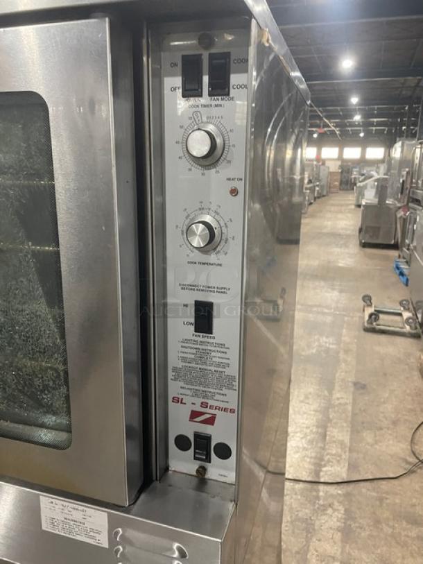 Southbend SLGS/22SC double stacked convection oven, stainless steel, natural gas, thermostatic control, on casters.
