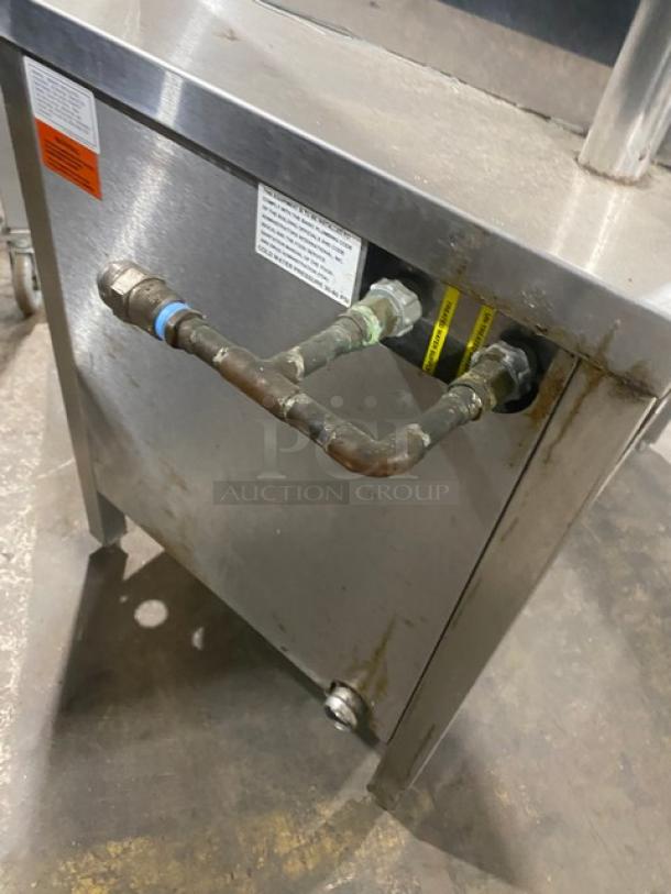 Groen HY-6E dual compartment electric convection steamer, stainless steel, 6-pan capacity, with control panel, 480V, on legs.