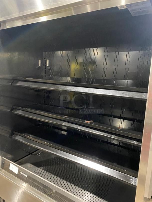 Structural Concepts Oasis Series B42 stainless steel refrigerated multi-tier display case, model B42, SN: 1062076 JU322912, 120V.