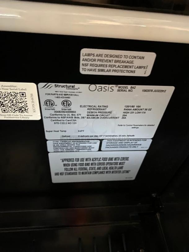 Structural Concepts Oasis B42 commercial refrigerated merchandiser. Model B42, SN: 1062076 JU322912, 120V 1 Phase.