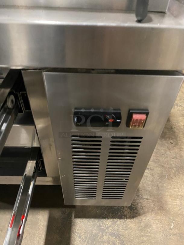 Universal Coolers stainless steel two-drawer refrigerated chef base, Model CBI52, SN: 6809260222022806, on casters.