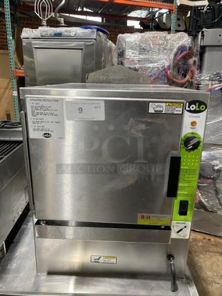 LoLo stainless steel countertop steamer, natural gas-powered, single compartment with pan holding rack, excellent condition.