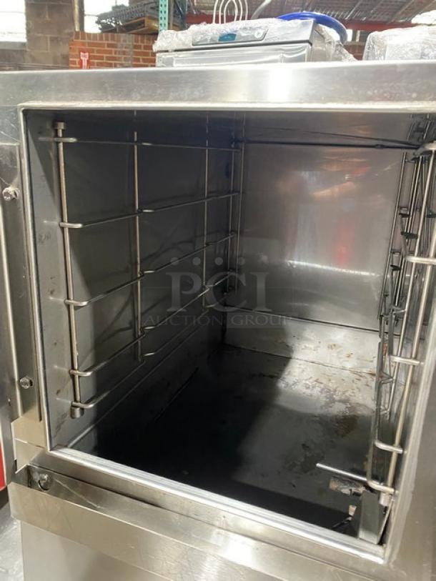 LoLo stainless steel natural gas countertop steamer with built-in pan rack, single compartment, commercial use, open door view.
