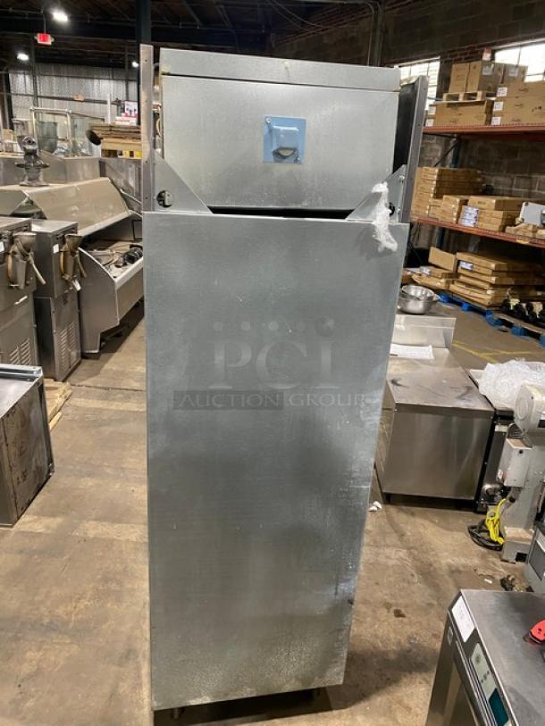 Delfield 6025XL-S single door stainless steel refrigerator, Energy Star certified, on casters, with poly-coated wire racks.