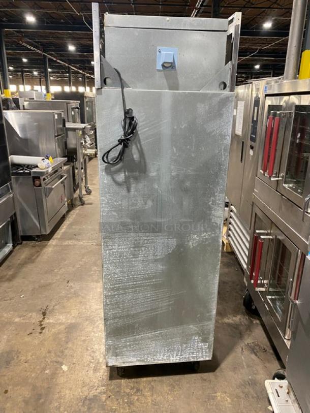 Delfield Spec Line 6125XL-S stainless steel single door freezer, Energy Star certified, on casters with wire racks.