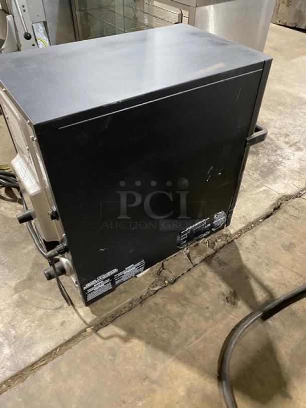 MerryChef Eikon E2S commercial rapid cook oven, black, electric, 208/240V, countertop model, good condition.