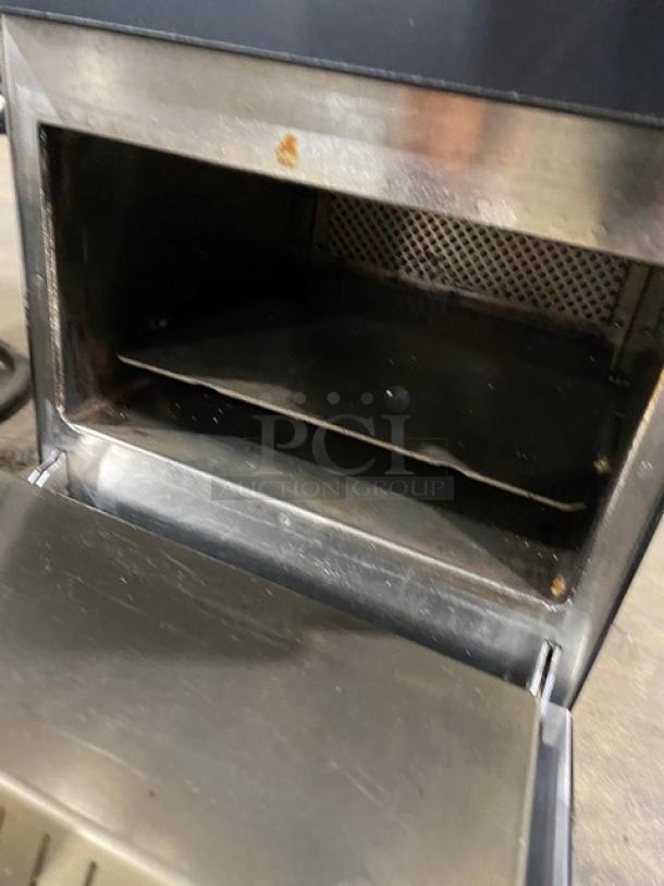 MerryChef Eikon E2S commercial black electric countertop rapid cook oven, model shown open, used condition.