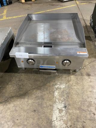 Stainless steel 2023 Standard Range SR-EG24 griddle, 24" countertop, thermostatic controls, back & side splash, on legs, new scratch-n-dent condition.