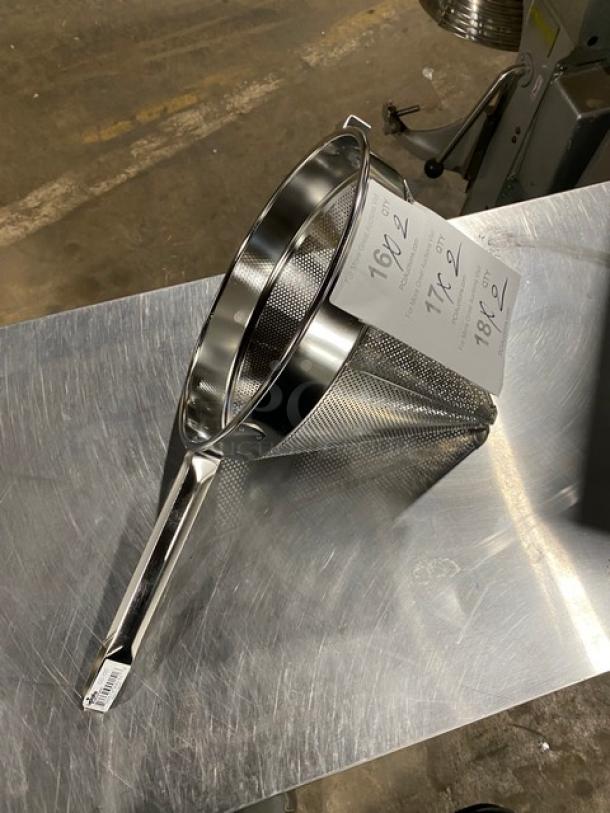 Brand new Update International stainless steel 12" round coarse mesh China cap strainer, model CC12C, on a metal surface.