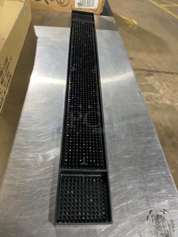 Brand new Update International BM27BK black rubber bar mat, 27-inch length, dot texture, ideal for commercial use.
