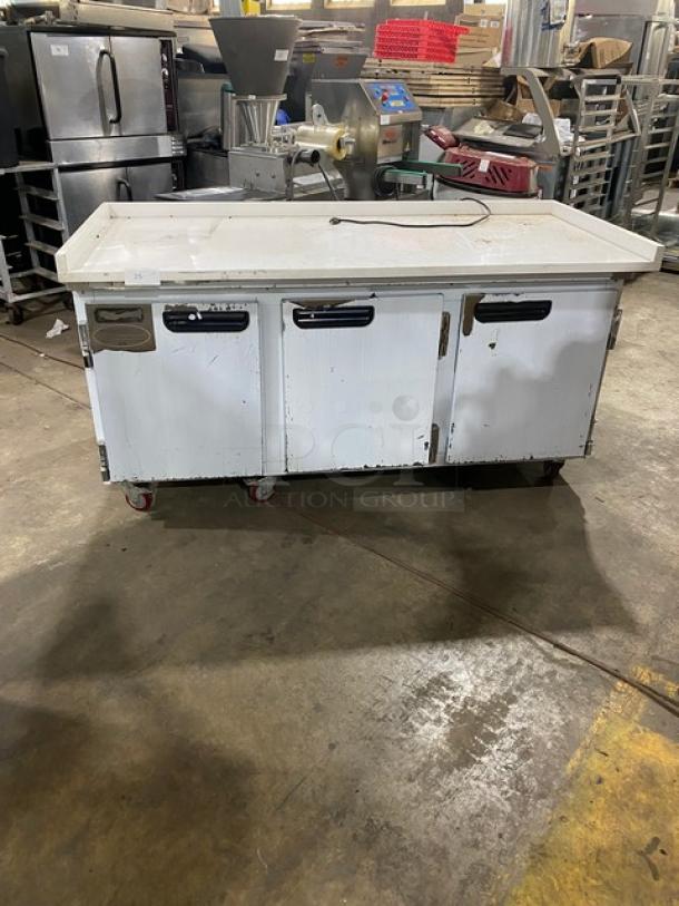 Leader Commercial 3 Door Refrigerated Lowboy/Worktop Cooler, Model ESLB72, with back & side splash, on casters.