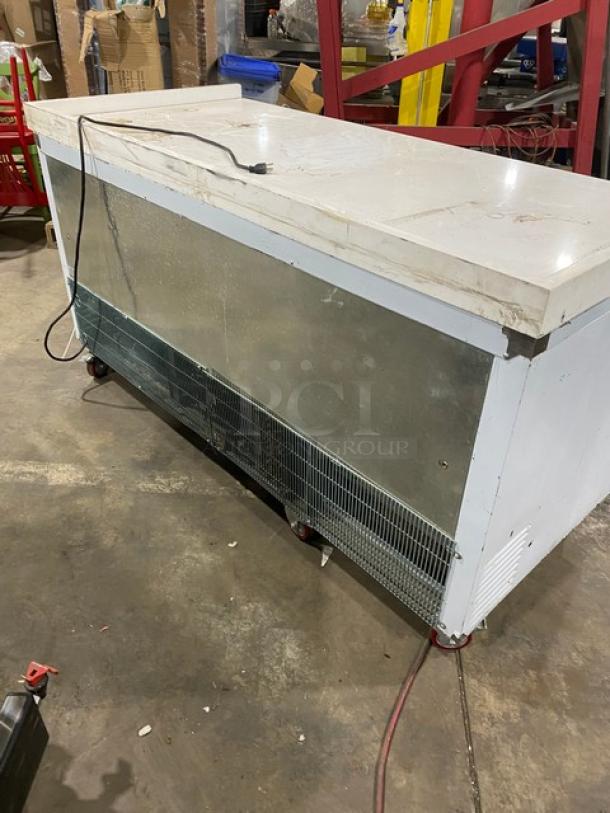 Leader ESLB72 3-Door Refrigerated Lowboy Cooler, white, with back and side splash, poly coated racks, 115V, on casters.