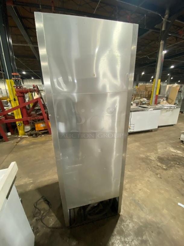 True T-23F stainless steel single door reach-in freezer, Energy Star certified, includes poly-coated wire rack, model SN: 7735473.