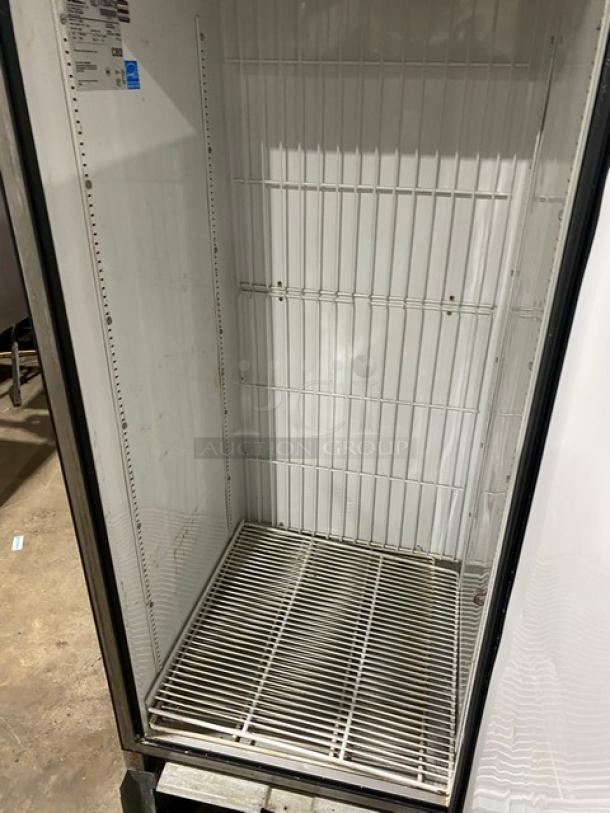 True T-23F commercial stainless steel single-door reach-in freezer, Energy Star certified, with poly-coated wire rack, model and serial tags visible.