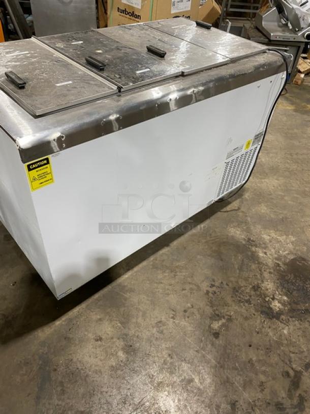 Excellence HFF8HC 54" ice cream dipping cabinet with stainless steel top, flip lids, and casters. Model: HFF-8HC SN: 2108109202.