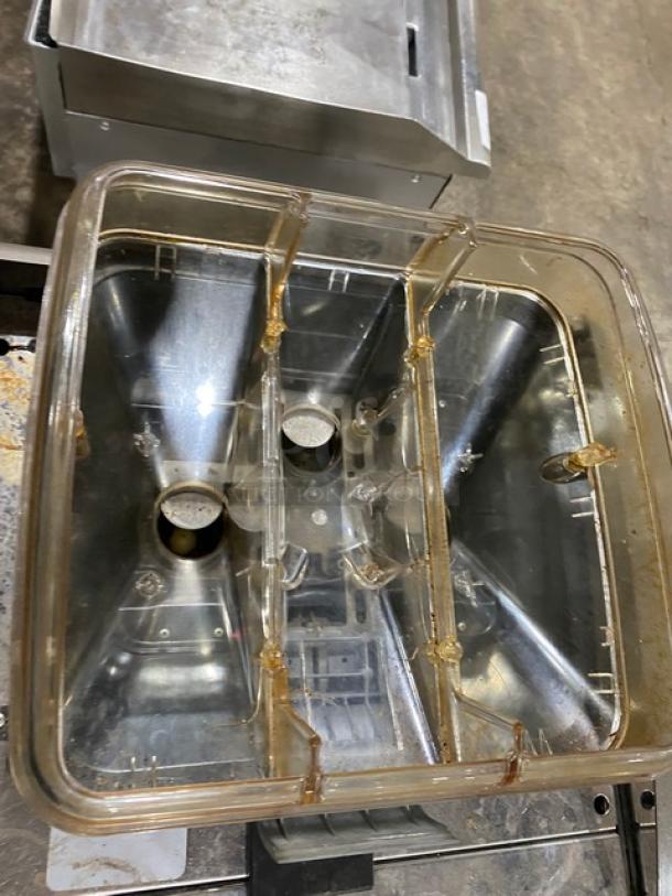 La Cimbali S39-Barsystem commercial espresso machine with clear polycarbonate hopper, steam wand, and drip tray on legs.