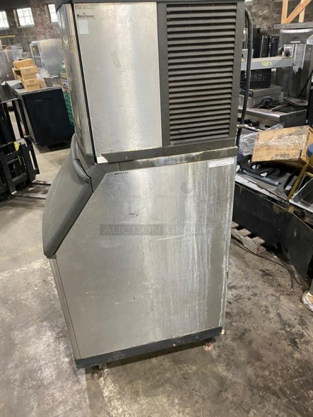 Manitowoc QY0454A stainless steel ice machine, air-cooled, electric, 115V, 1 phase, used condition, on legs.