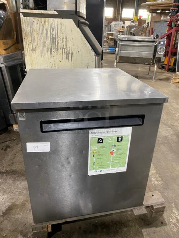 Delfield Enodis 406-STAR2 stainless steel undercounter refrigerator in used condition, with visible recycling instructions label.