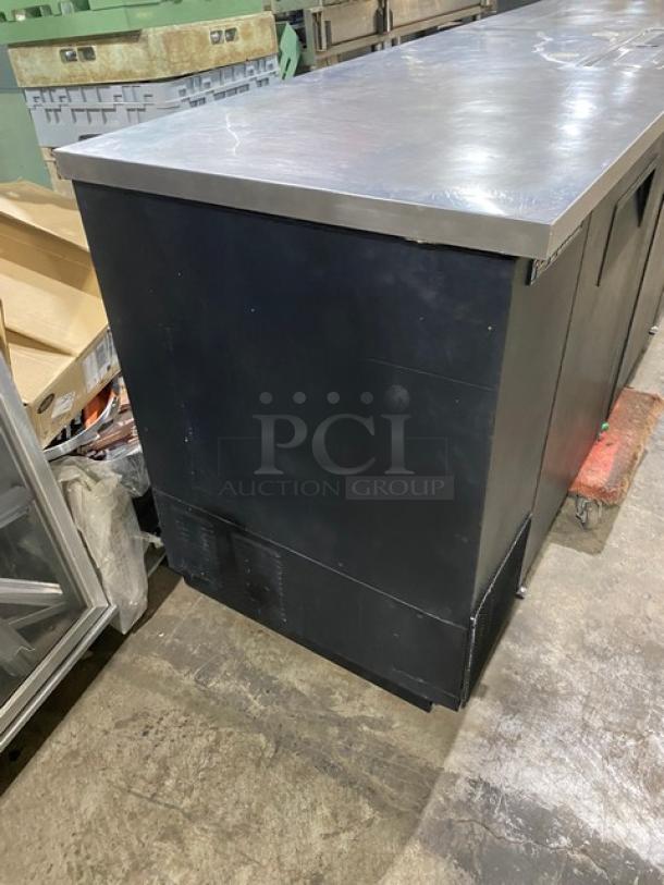 True TDD-4 kegerator, black powder-coated, 3 doors, 90" length, stainless steel worktop, drip tray, SN: 7296168, 115V 1 Phase.
